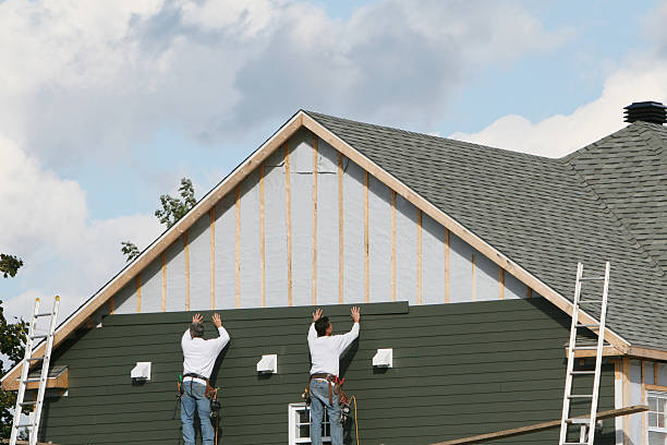 Professional Storm Damage Siding Repair technician working in Ward, SC